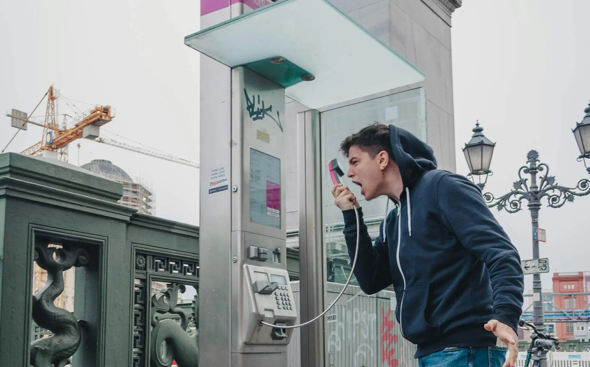 image of a guy shouting into a telephone